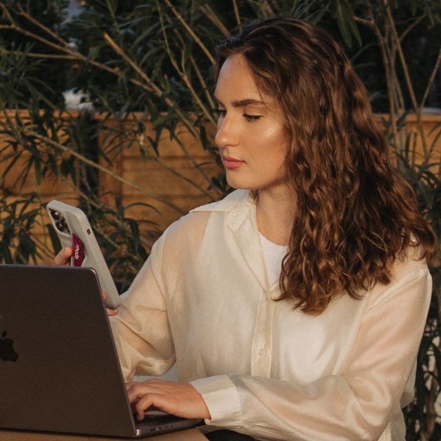Karina Shalia working with a laptop